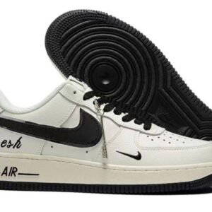 White and black Nike Air Force 1 Low custom sneakers with “Fresh” text and black outsole.